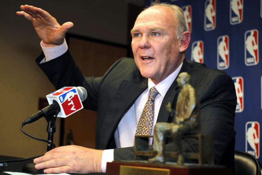 Nuggets Coach George Karl addresses the media Wednesday in Denver.