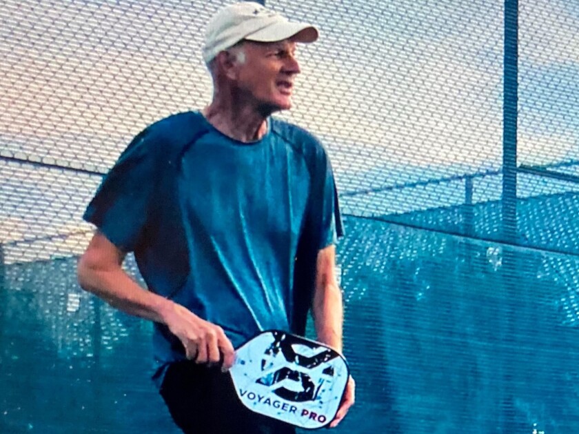 Clint Burkett on the court at the Alta Mira Tennis Club in Carlsbad in Feb. 2022