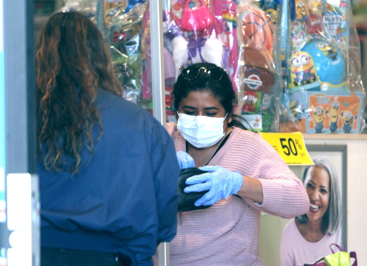 A masked shopper at Rite Aid in La Cañada Flintridge