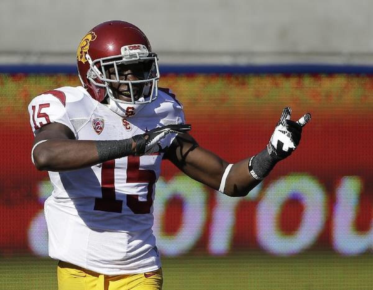 USC wide receiver Nelson Agholor celebrates after one of two touchdowns he scored on punt returns Saturday against California.