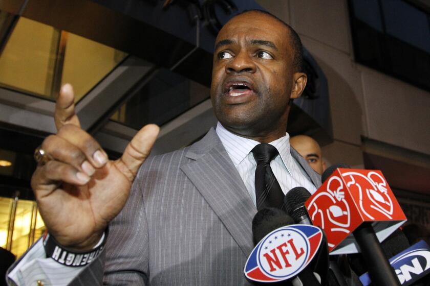NFL Players Assn. Executive Director DeMaurice Smith criticized the league's new domestic violence training and education program for treating all players as perpetrators.