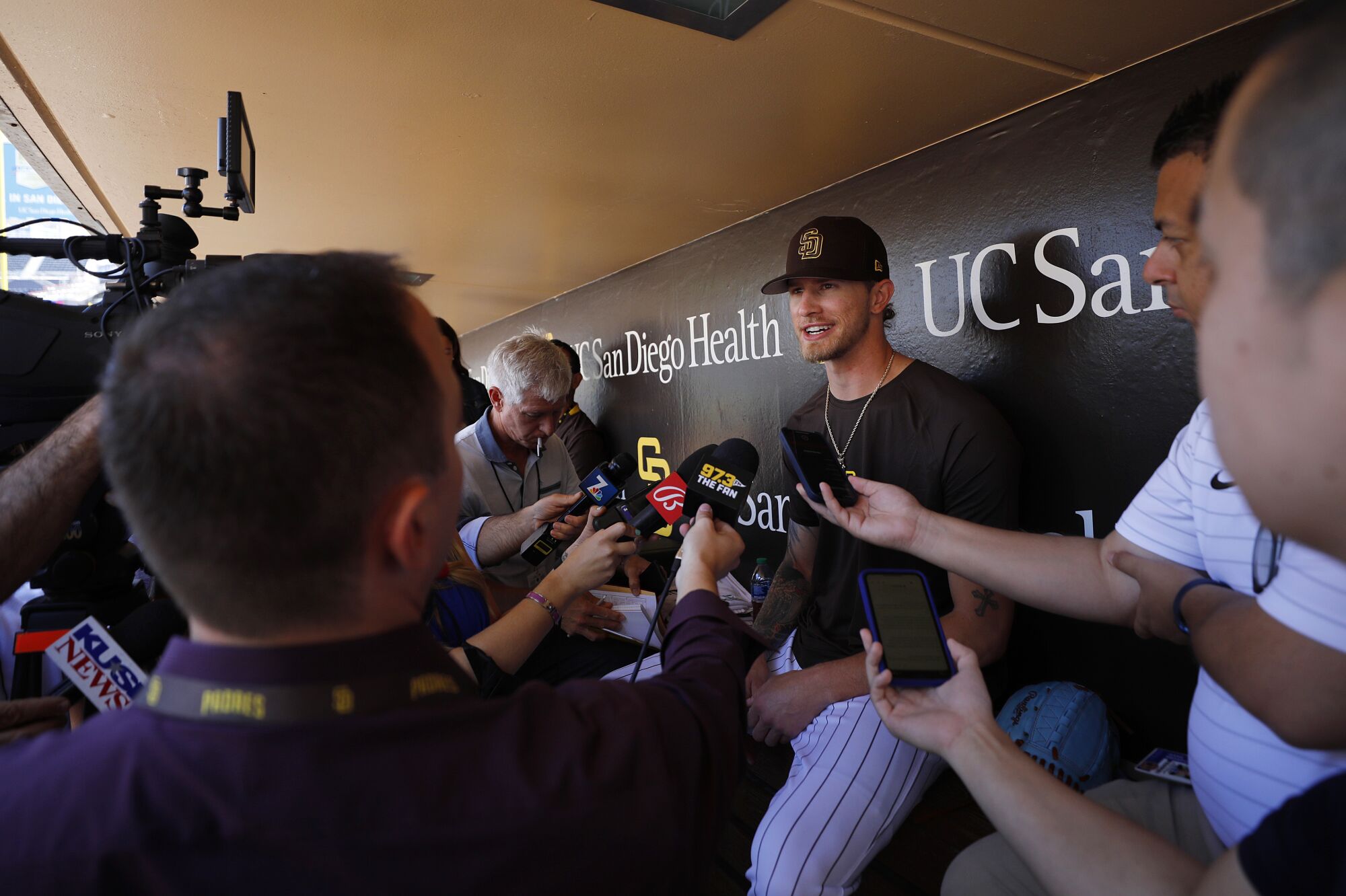 The Padres acquired closer Josh Hader from the Brewers, shown here talking with the media before a game on Tuesday morning.