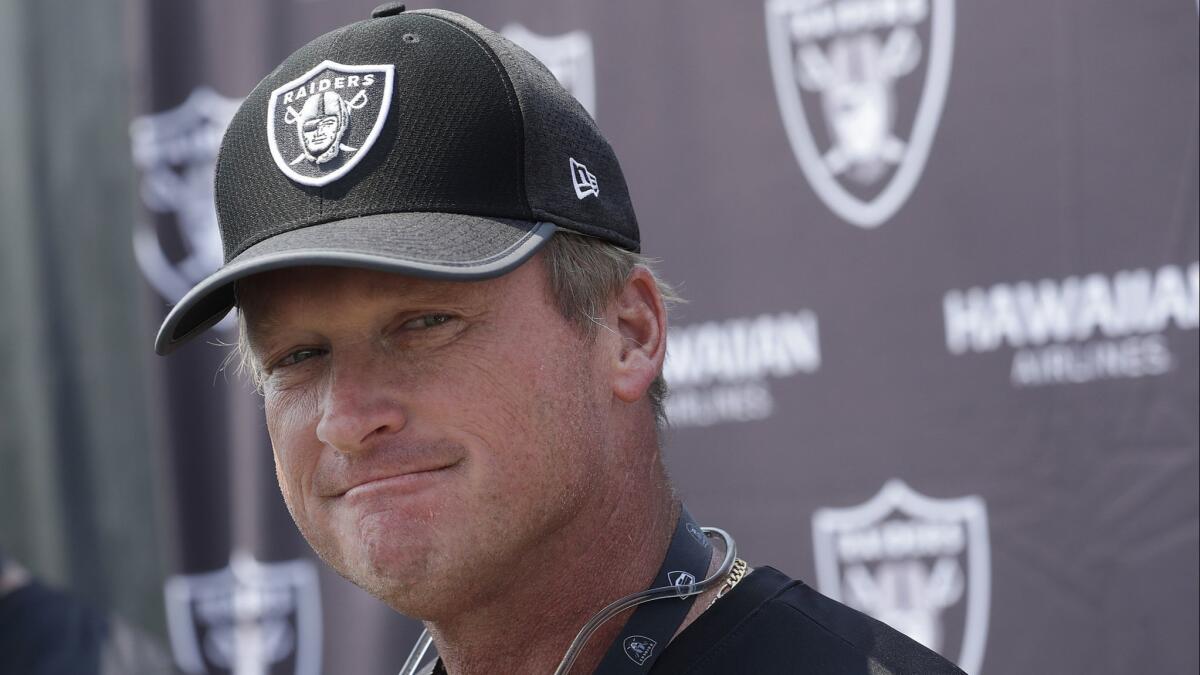 Jon Gruden speaks to reporters after the Raiders' practice in Napa, Calif., on Aug. 1.