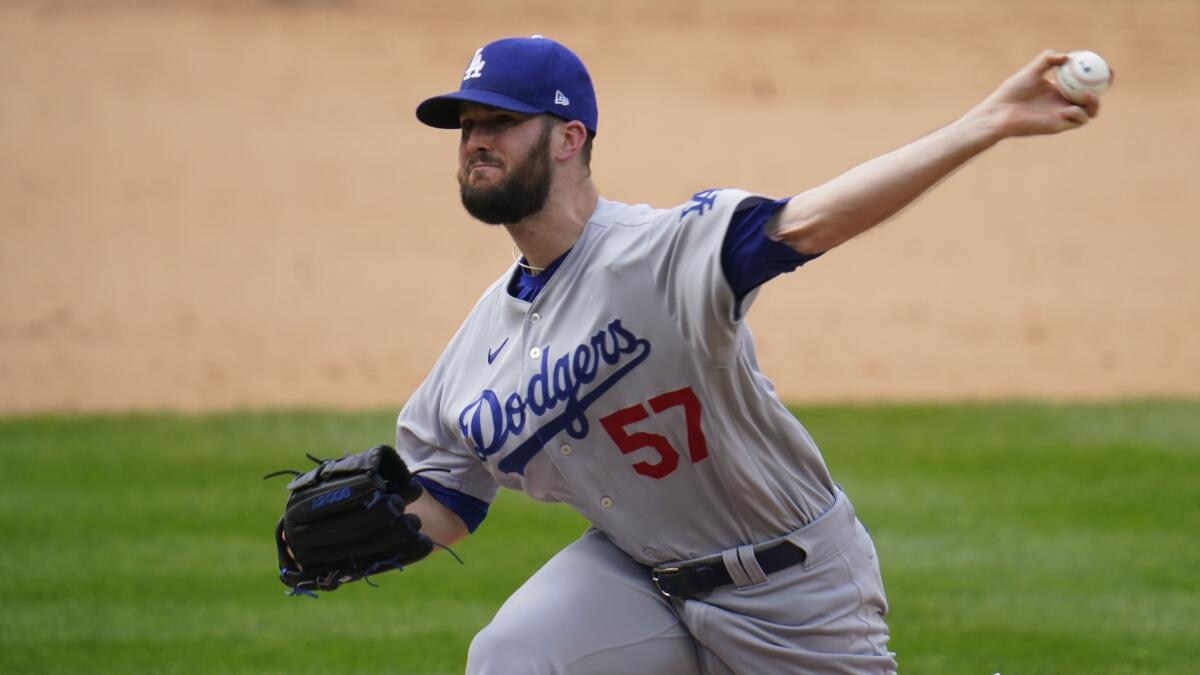 Dodgers starting pitcher Alex Wood delivers against the Colorado Rockies in September.