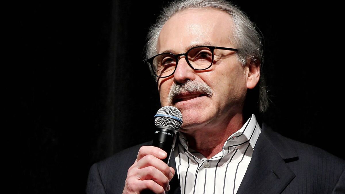 David Pecker, chairman and CEO of American Media, speaks at the Shape and Men's Fitness Super Bowl party in 2014.