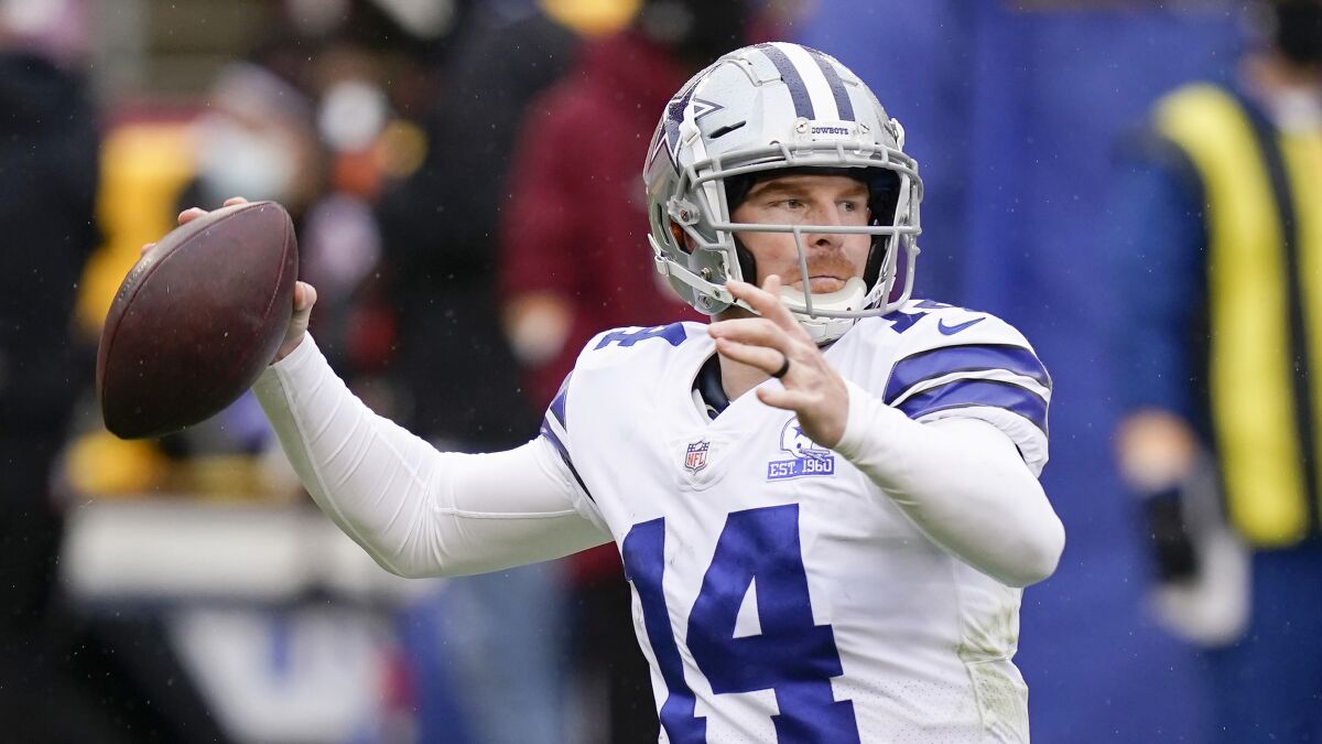 Dallas Cowboys quarterback Andy Dalton (14) passing the ball against Washington Football Team in the first half of an NFL football game, Sunday, Oct. 25, 2020, in Landover, Md. (AP Photo/Patrick Semansky)
