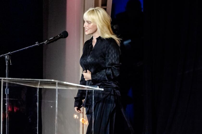 Singer Billie Eilish introduced Gustavo Dudamel and the Los Angeles Philharmonic during the reopening of the Hollywood Bowl.