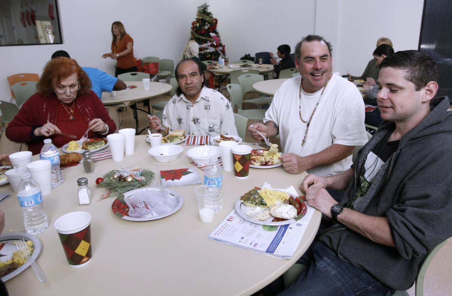Photo Gallery: Skip1.org volunteers serve Christmas breakfast at Ascencia
