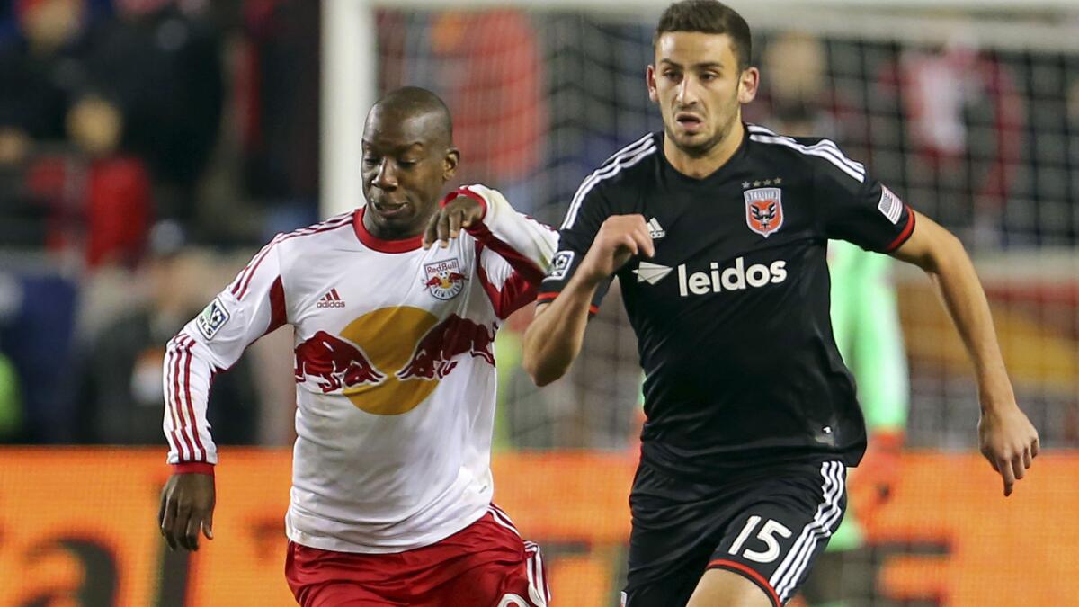 D.C. United defender Steve Birnbaum, right, is pressured by Red Bulls forward Bradley Wright-Phillips while bringing the ball up the pitch during a Major League Soccer game Nov. 2.