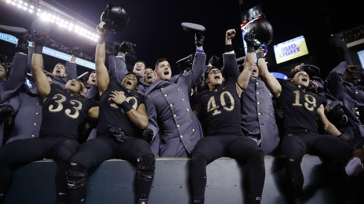 Army players celebrate a victory over Navy on Dec. 8, 2018, in Philadelphia.
