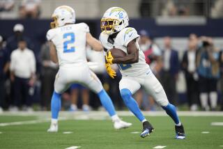 Los Angeles Chargers wide receiver Derius Davis (12) runs for a touchdown.