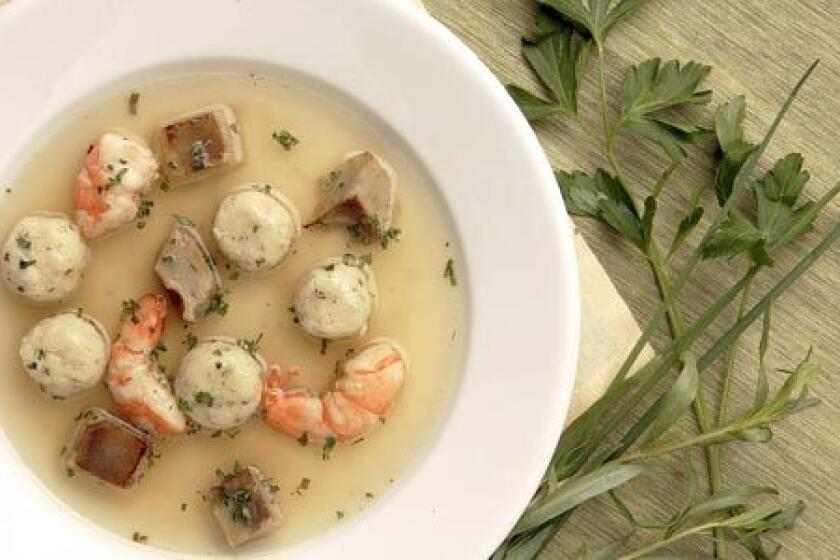 BRIGHT AND EASY: Shrimp and artichoke soup with spring herb gnocchi.