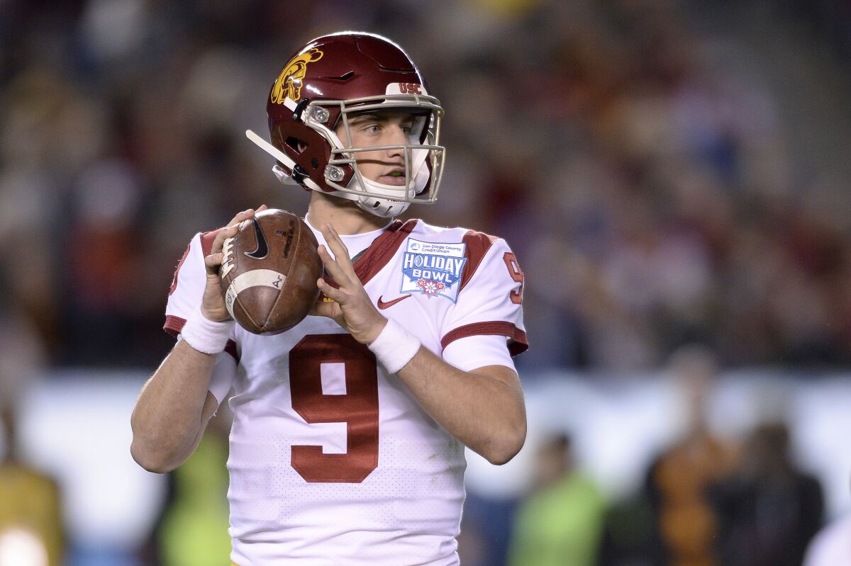 USC quarterback Kedon Slovis looks to pass during the first half of the Holiday Bowl against Iowa on Dec. 27.
