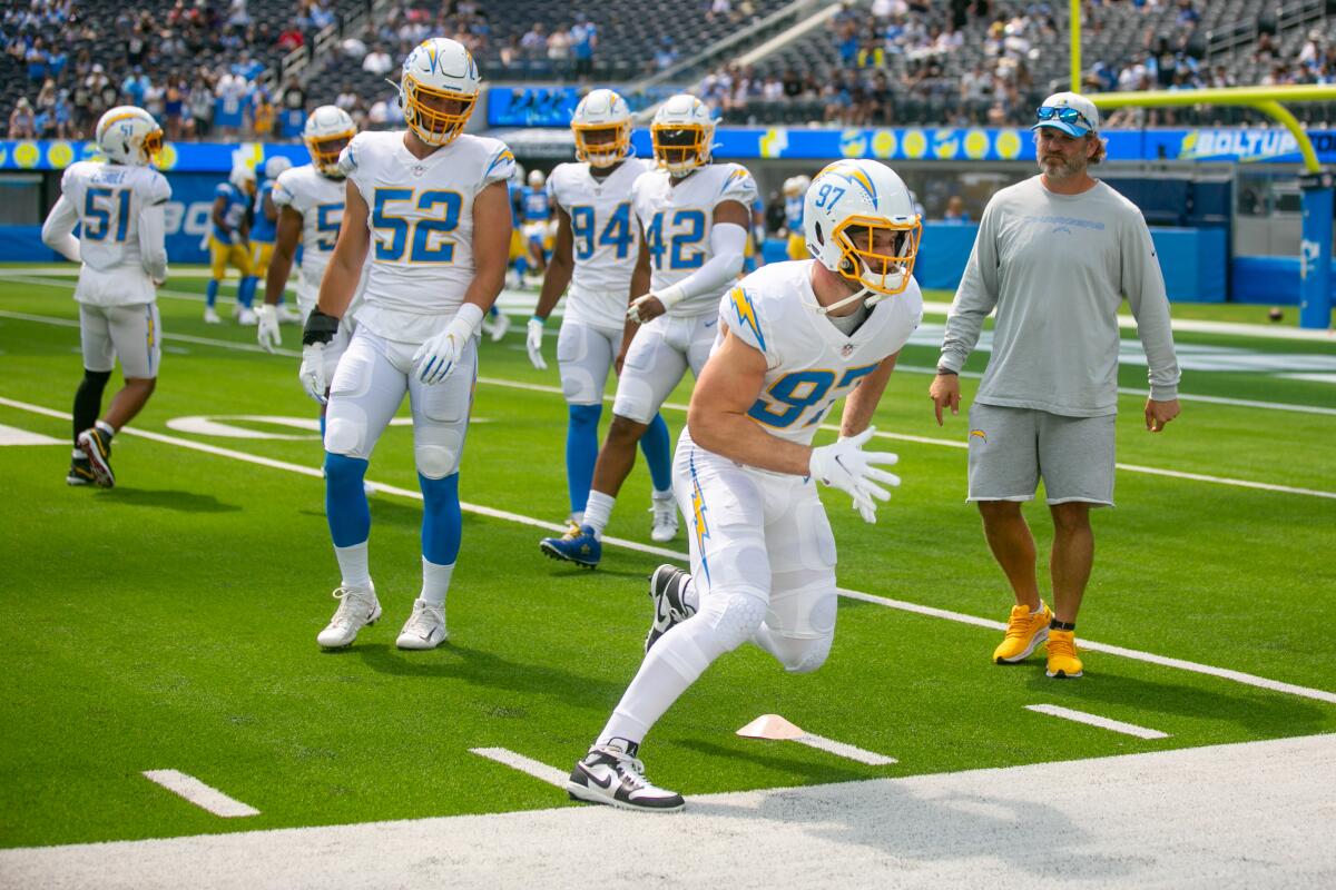 Chargers linebacker Joey Bosa runs a drill during practice.