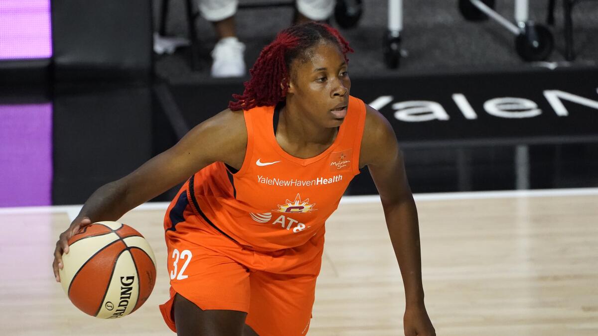 Connecticut Sun guard Bria Holmes drives to the basket against the New York Liberty on Sept. 1, 2020, in Bradenton, Fla.