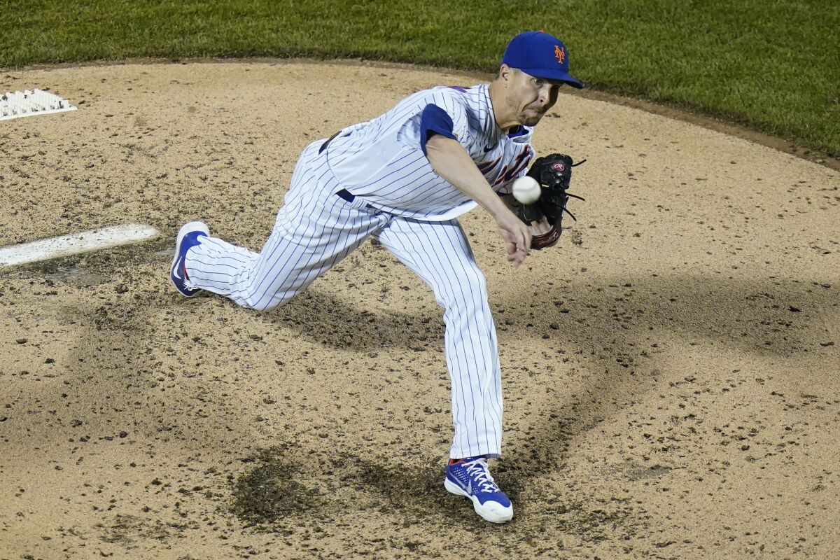 New York Mets' Jacob deGrom delivers a pitch during the fourth inning of a baseball game against the Boston Red Sox Wednesday, April 28, 2021, in New York. (AP Photo/Frank Franklin II)