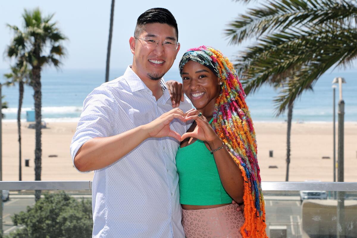 Huntington Beach's Richard Kuo, left, and Dom Jones, are competitors on the new season of "The Amazing Race."