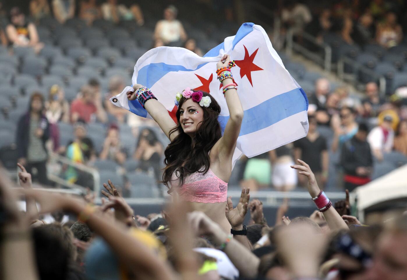 Music fans dance at Spring Awakening, a three-day electronic dance music festival, held at Soldier Field in Chicago.