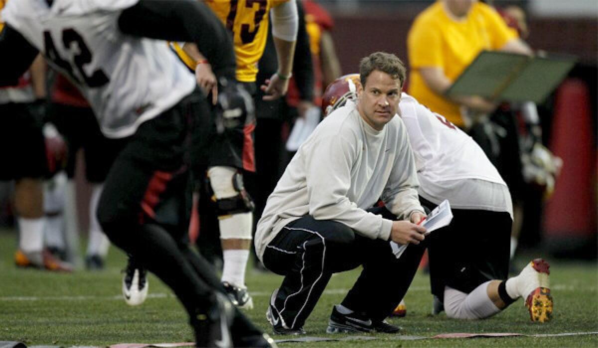 Lane Kiffin looks to put USC's disappointing 7-6 season in the past as training camp opens for the Trojans on Saturday.