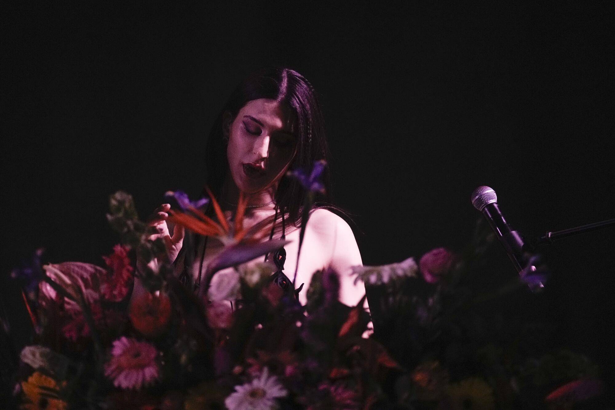 A instrumentalist performs onstage