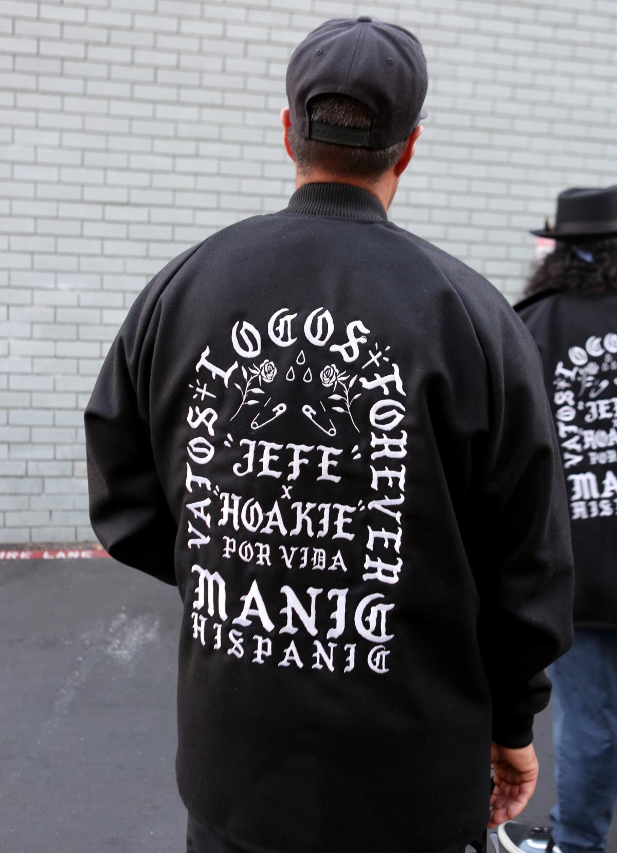 Manic Hispanic's Gilbert "Dreamer" Pichardo wears a jacket memorializing Gabby "Jefe" Gaborno and Steve "Hoakie" Soto.
