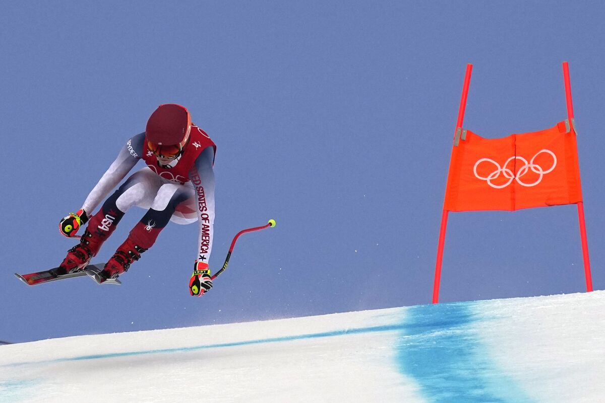 United State's Mikaela Shiffrin makes a jump during the women's downhill at the 2022 Winter Olympics.