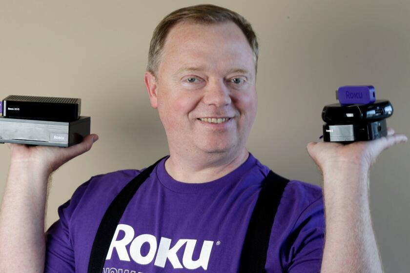 In this May 19, 2014 photo, Anthony Wood, CEO of Roku, poses for a portrait at the company's headquarters in Saratoga, Calif. While Netflix CEO Reed Hastings gets marquee billing for building an Internet video service with 48 million worldwide subscribers, Wood has quietly worked behind the scenes making Roku streaming devices that make it easier and more enjoyable to watch Netflixs vast library of movies and TV shows. (AP Photo/Marcio Jose Sanchez)