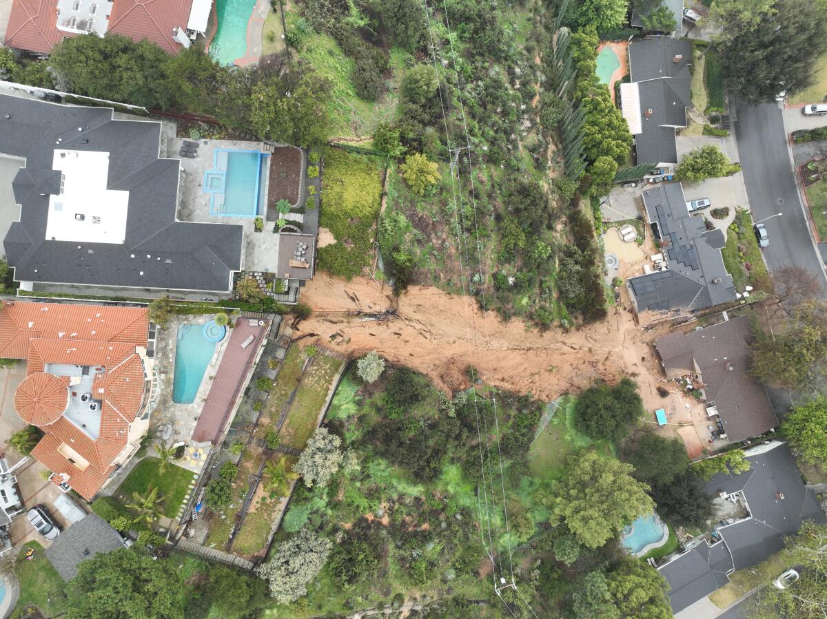 An aerial view showing the landslide damage that yellow-tagged two homes