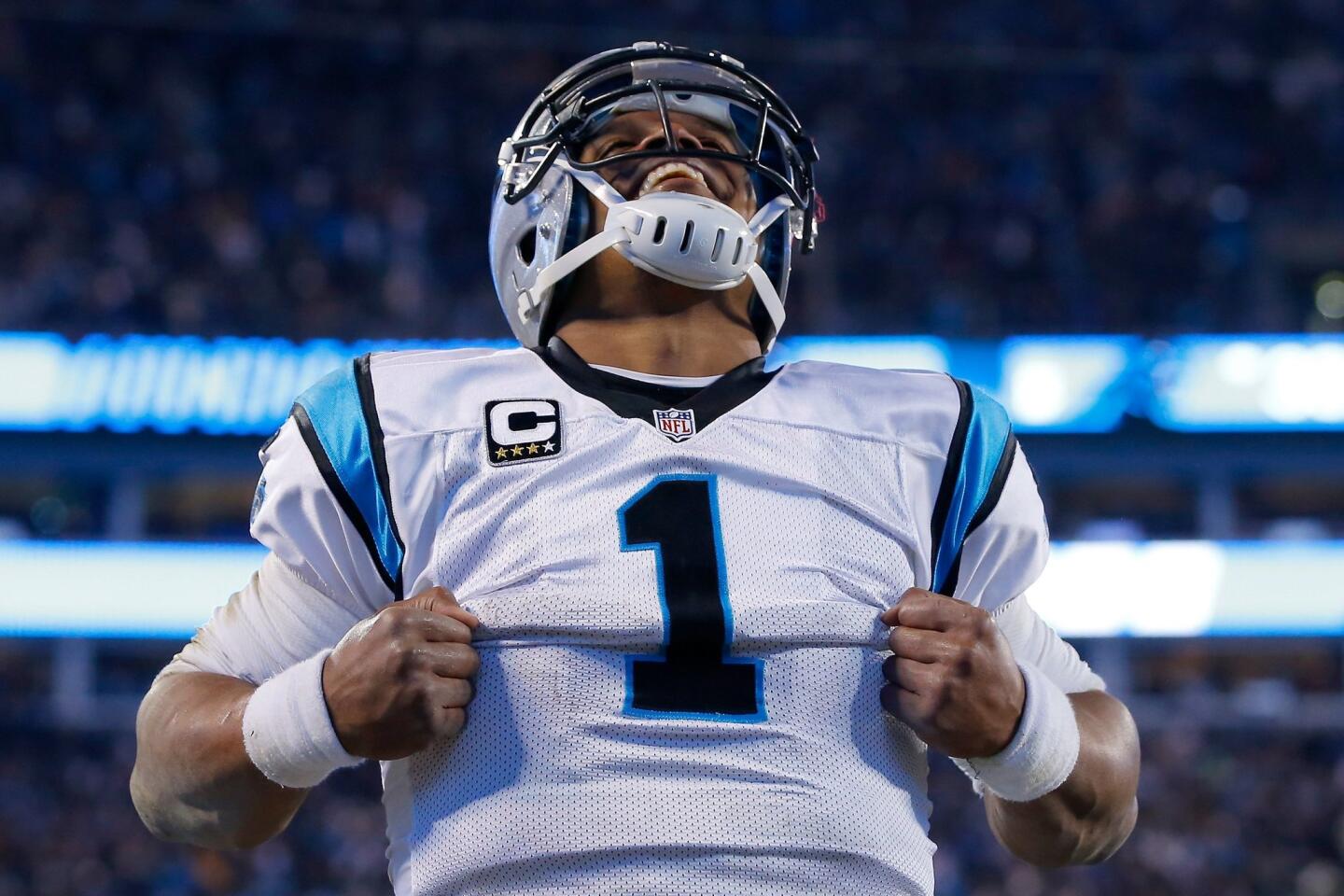 CHARLOTTE, NC - JANUARY 24: Cam Newton #1 of the Carolina Panthers celebrates after scoring a touchdown in the third quarter against the Arizona Cardinals during the NFC Championship Game at Bank of America Stadium on January 24, 2016 in Charlotte, North Carolina. (Photo by Kevin C. Cox/Getty Images) ** OUTS - ELSENT, FPG, CM - OUTS * NM, PH, VA if sourced by CT, LA or MoD **