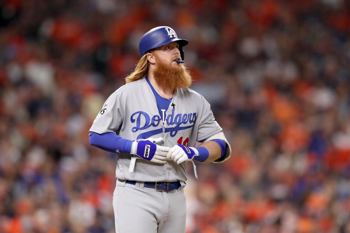 HOUSTON, TX - OCTOBER 29: Justin Turner #10 of the Los Angeles Dodgers looks on against the Houston Astros in game five of the 2017 World Series at Minute Maid Park on October 29, 2017 in Houston, Texas.
