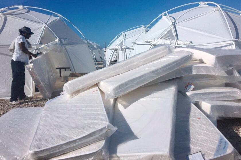 FILE - This file photo provided by Jake Strang shows mattress and tents set up for attendees of the Fyre Festival, Friday, April 28, 2017, in the Exuma islands, Bahamas. Litigation is piling up against organizers of the Fyre Festival that flamed out in a fiasco in the Bahamas in April. Lawsuits have been filed in federal courts in Los Angeles, New York and Miami in the past month as well as several state courts. (Jake Strang via AP, File)