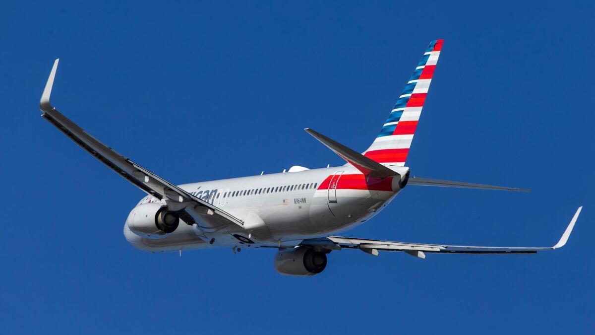A Boeing 737 departs from Ronald Reagan National Airport in Arlington, Va. on March 12.
