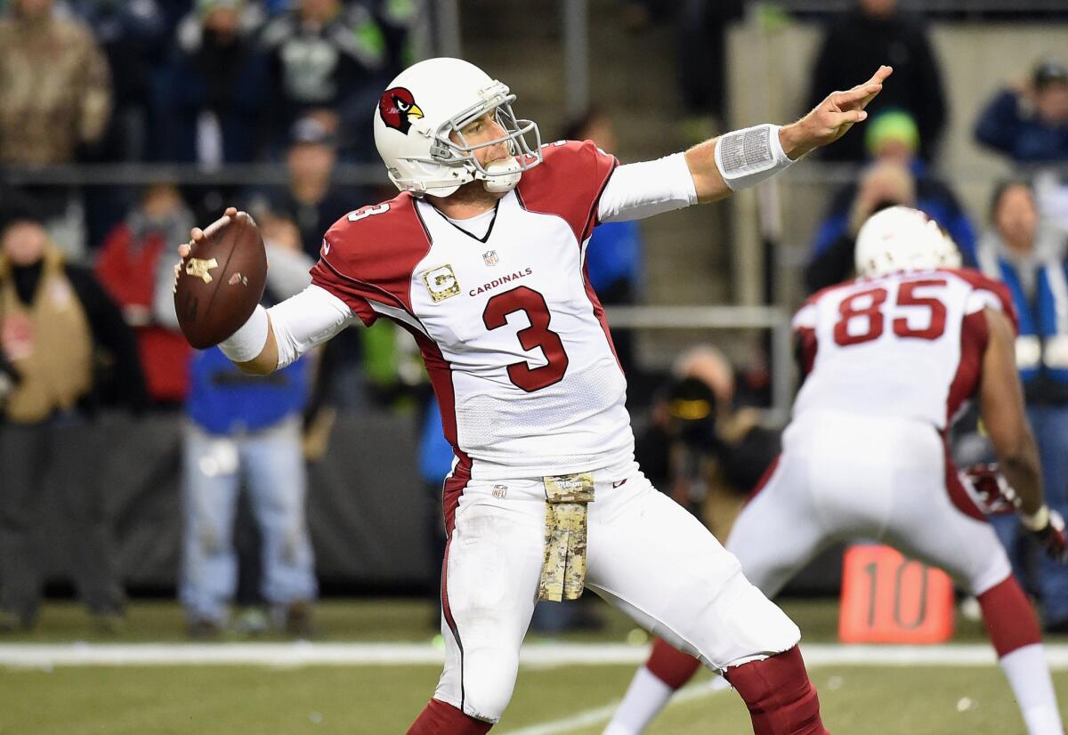 Cardinals quarterback Carson Palmer passed for 363 yards and three touchdowns in Arizona's 39-32 win over the Seahawks.