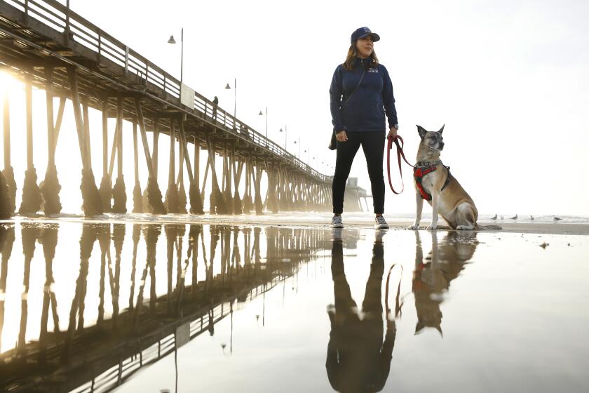 San Diego CA - December 22: Newly elected Imperial Beach Mayor Paloma Aguirre with her dog Dasha in Imperial Beach on Thursday, December 22, 2022. (K.C. Alfred / The San Diego Union-Tribune)