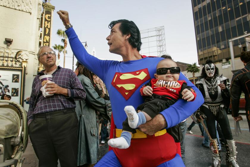 HOLLYWOOD, CA-MARCH 14, 2009: Christopher Dennis, dressed up as Superman, performs on Hollywood Blvd. in Hollywood. (Mel Melcon/Los Angeles Times)