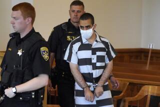 Hadi Matar, 24, arrives for an arraignment in the Chautauqua County Courthouse in Mayville, NY., Saturday, Aug. 13, 2022. Matar, accused of carrying out a stabbing attack against “Satanic Verses” author Salman Rushdie has entered a not-guilty plea in a New York court on charges of attempted murder and assault. (AP Photo/Gene J. Puskar)