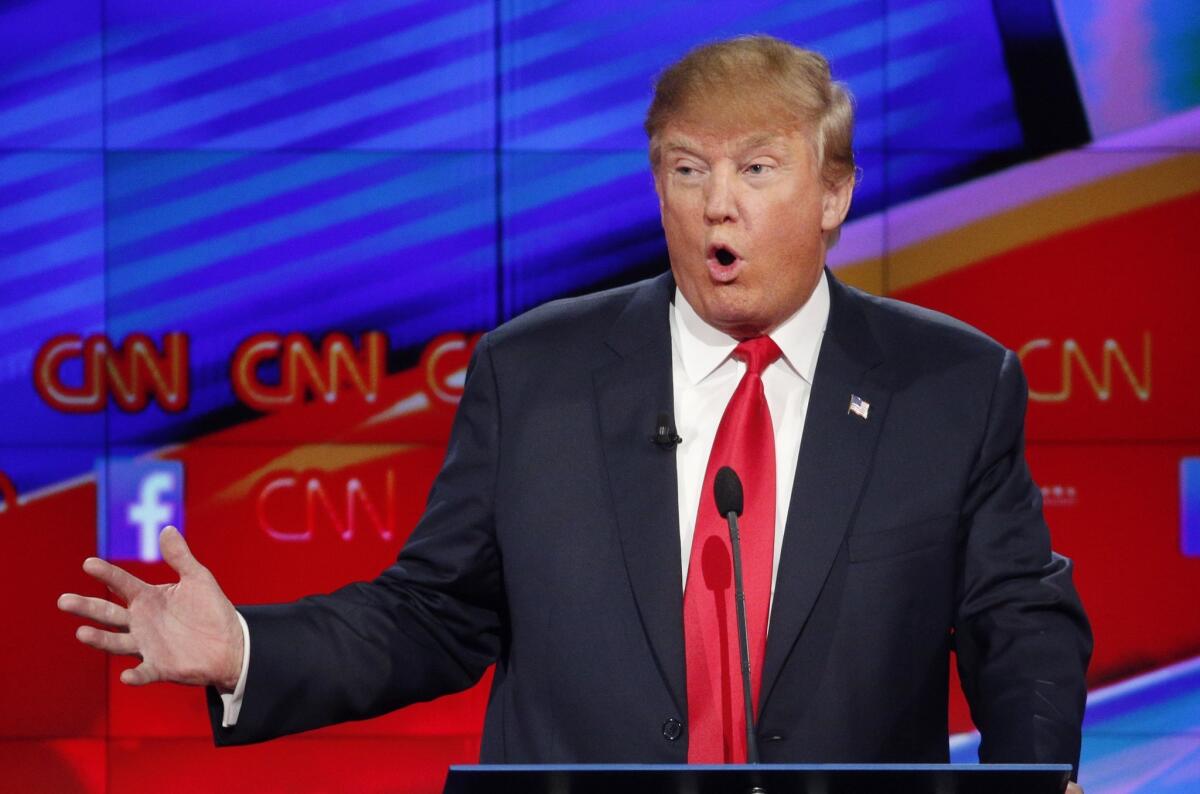 Donald Trump makes a point during the CNN Republican presidential debate at the Venetian Hotel & Casino in Las Vegas.