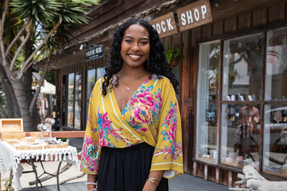 Toni Junious poses at Village Rock Shop Carlsbad, CA 