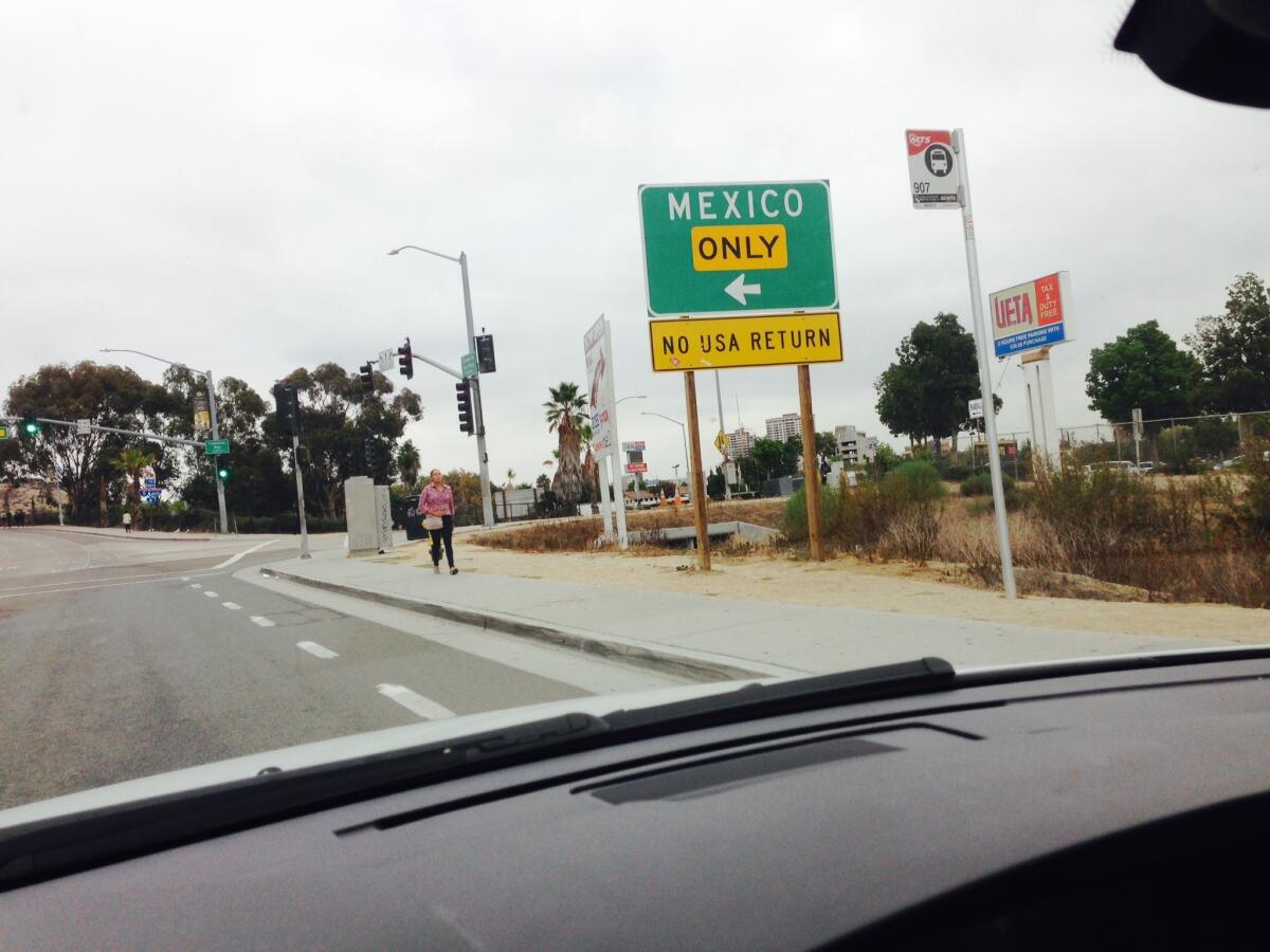 Near Saturday's planned protest site, former Marine Andrew Tahmooressi apparently missed this sign warning motorists that a left turn from Camino de la Plaza in San Ysidro will take them straight into Mexico.