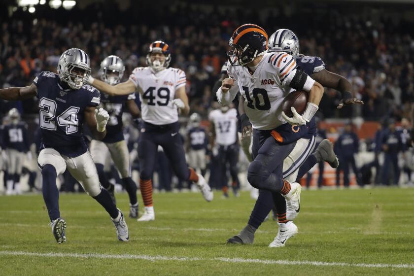 Chicago Bears quarterback Mitchell Trubisky (10) runs for a touchdown during the second half of an NFL football game against the Dallas Cowboys, Thursday, Dec. 5, 2019, in Chicago. (AP Photo/Morry Gash)