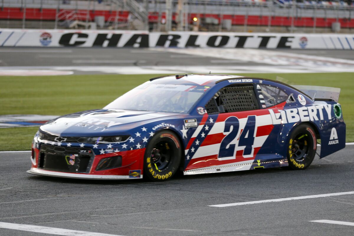 FILE - NASCAR Cup Series driver William Byron (24) drives down pit road during a NASCAR Cup Series auto race at Charlotte Motor Speedway in Concord, N.C., in this Sunday, May 30, 2021, file photo. Liberty University has reached a five-year extension with Hendrick Motorsports to continue as a primary sponsor for William Byron. Byron is a junior pursuing a degree in strategic communication through Liberty University’s online program. (AP Photo/Nell Redmond, File)