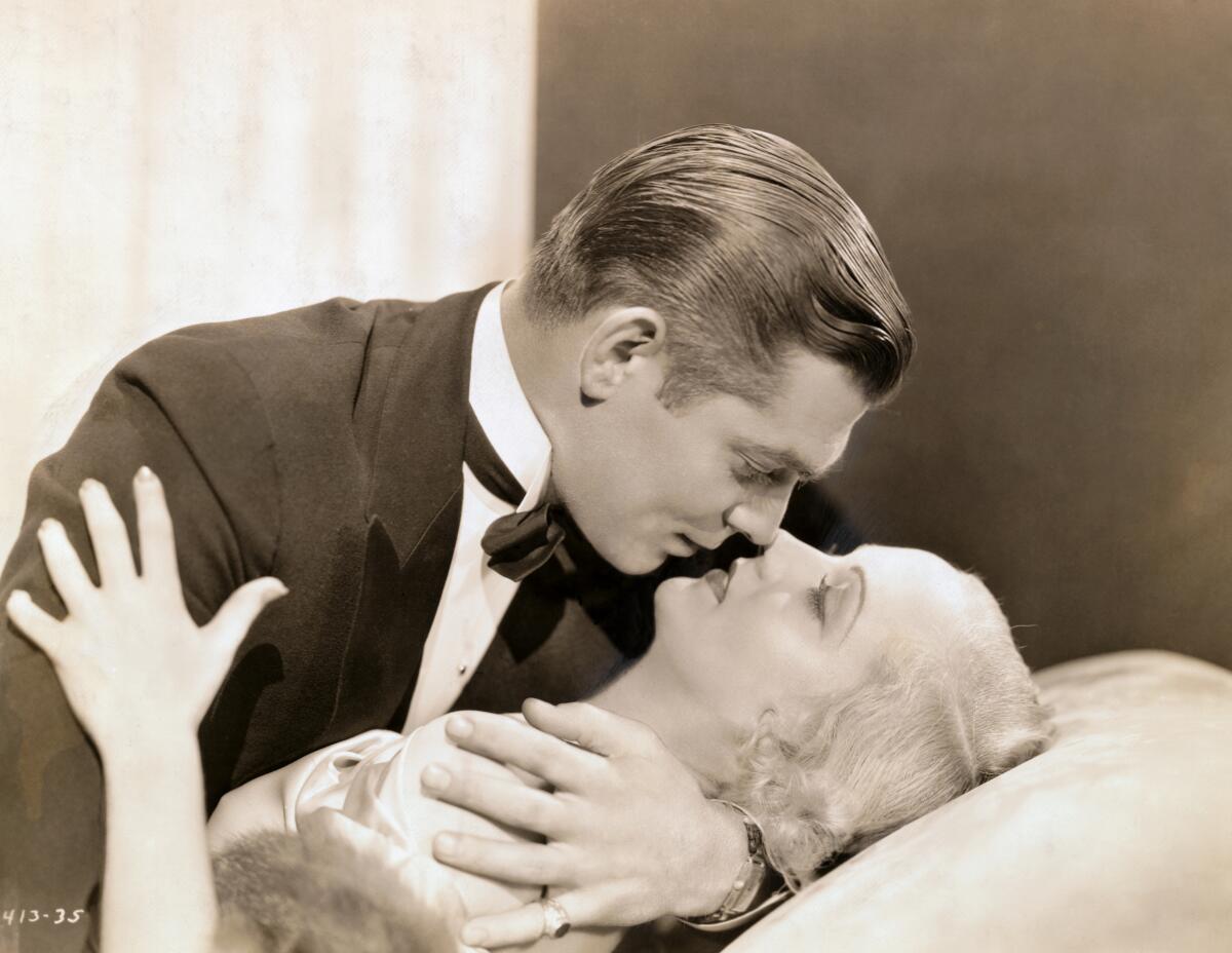 Clark Gable embracing Carole Lombard in "No Man of Her Own."