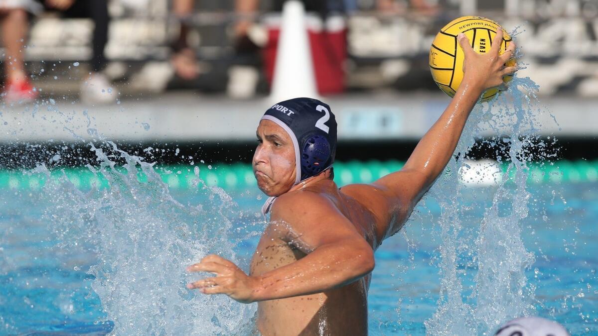 Newport Harbor High's Makoto Kenney, shown taking a shot against Mater Dei on Sept. 6, led the Sailors to a 13-10 win over Corona del Mar in the Battle of the Bay rivalry game on Wednesday.