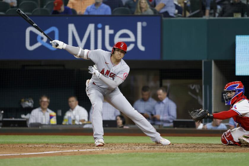 Los Angeles Angels' Shohei Ohtani (17) strikes out against the Texas Rangers during the fifth inning of a baseball game Tuesday, April 27, 2021, in Arlington, Texas. (AP Photo/Ron Jenkins)