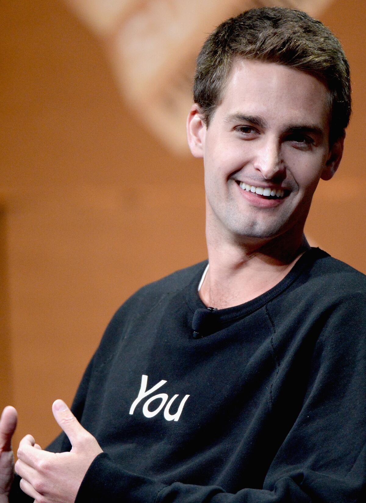Snapchat Chief Executive Evan Spiegel speaks during "Disrupting Information and Communication" at the Vanity Fair New Establishment Summit at Yerba Buena Center for the Arts Oct. 8 in San Francisco