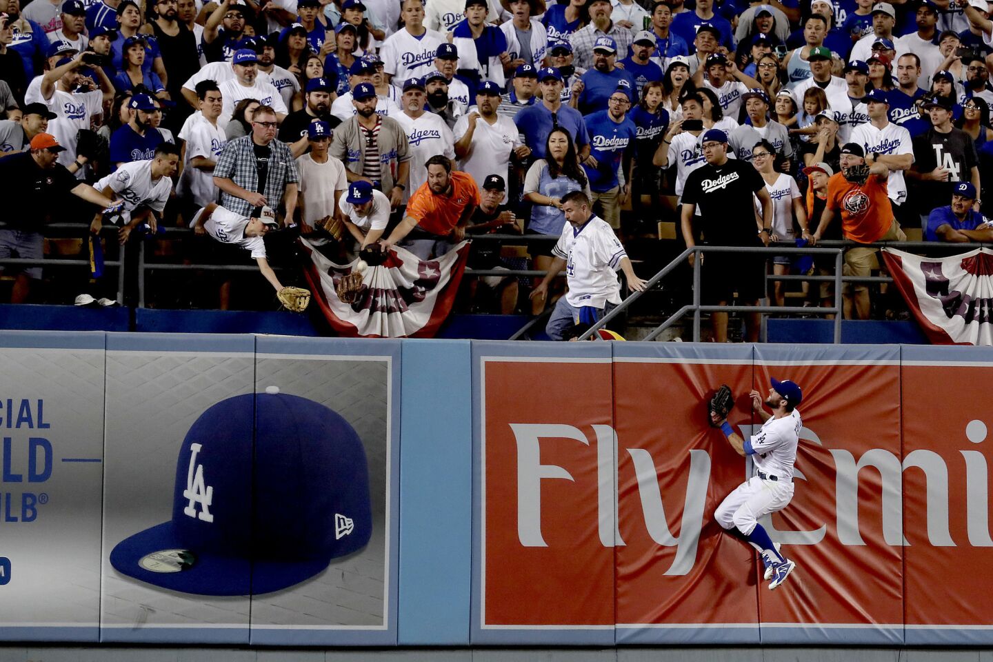 Chris Taylor can't get to a home run by Houston's Marwin Gonzalez during the ninth inning of Game 2.