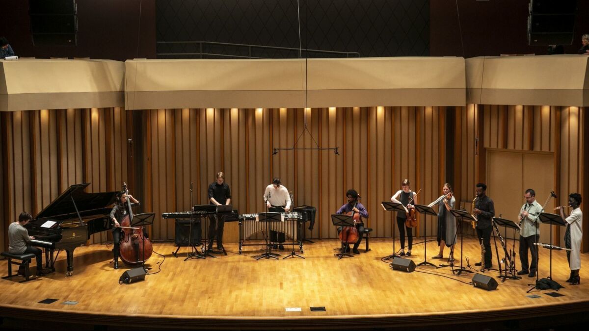 Julius Eastman's 'Femenine' is performed at Monday Evening Concerts by an ensemble including artistic director Jonathan Hepfer on vibraphone, center, and cellist Seth Parker Woods, to his right, at Zipper Concert Hall