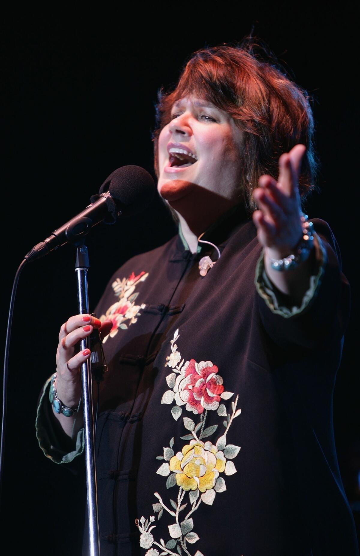 Singer Linda Ronstadt performs at the Dunkin' Donuts Newport Folk Festival in Newport, Rhode Island.