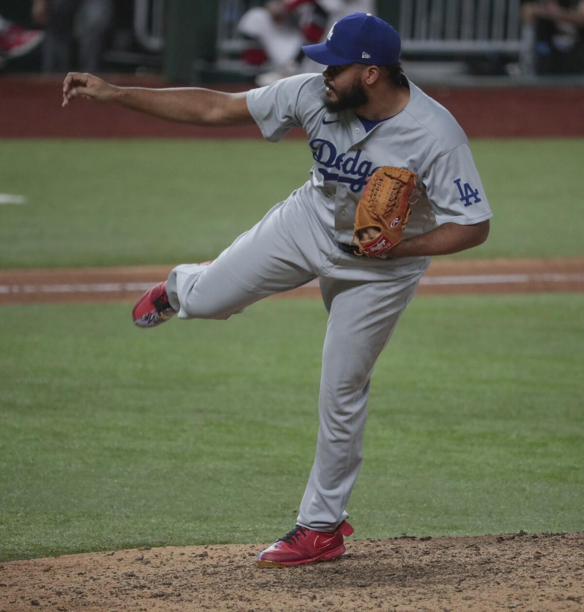 Dodgers relief pitcher Kenley Jansen delivers during the sixth inning of Game 3 of the NLCS.