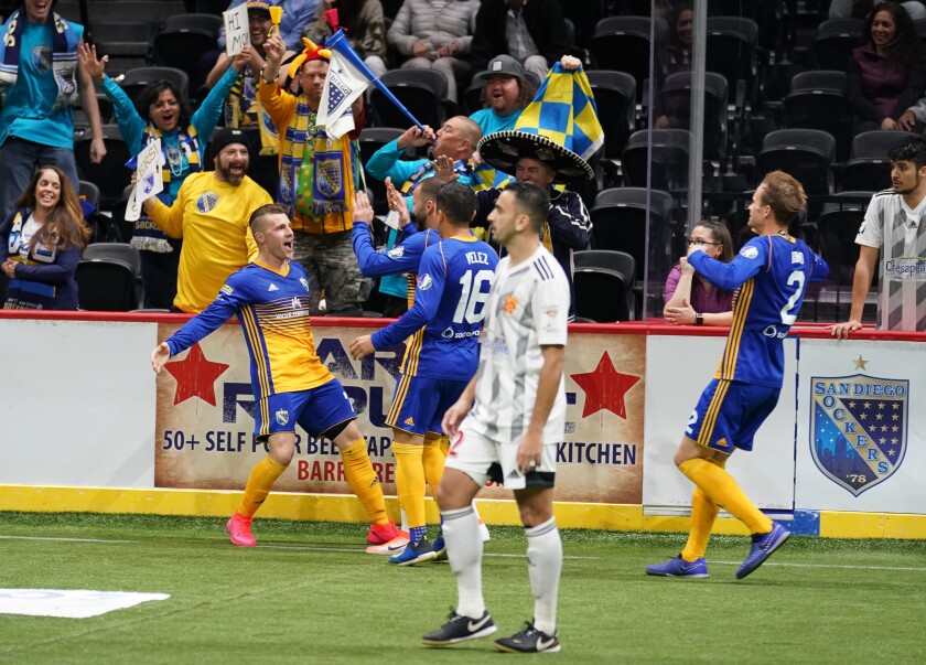 The Sockers' Brian Farber (far left) celebrates his goal with teammates in San Diego's victory over the Baltimore Blast on Wednesday, Feb. 12.